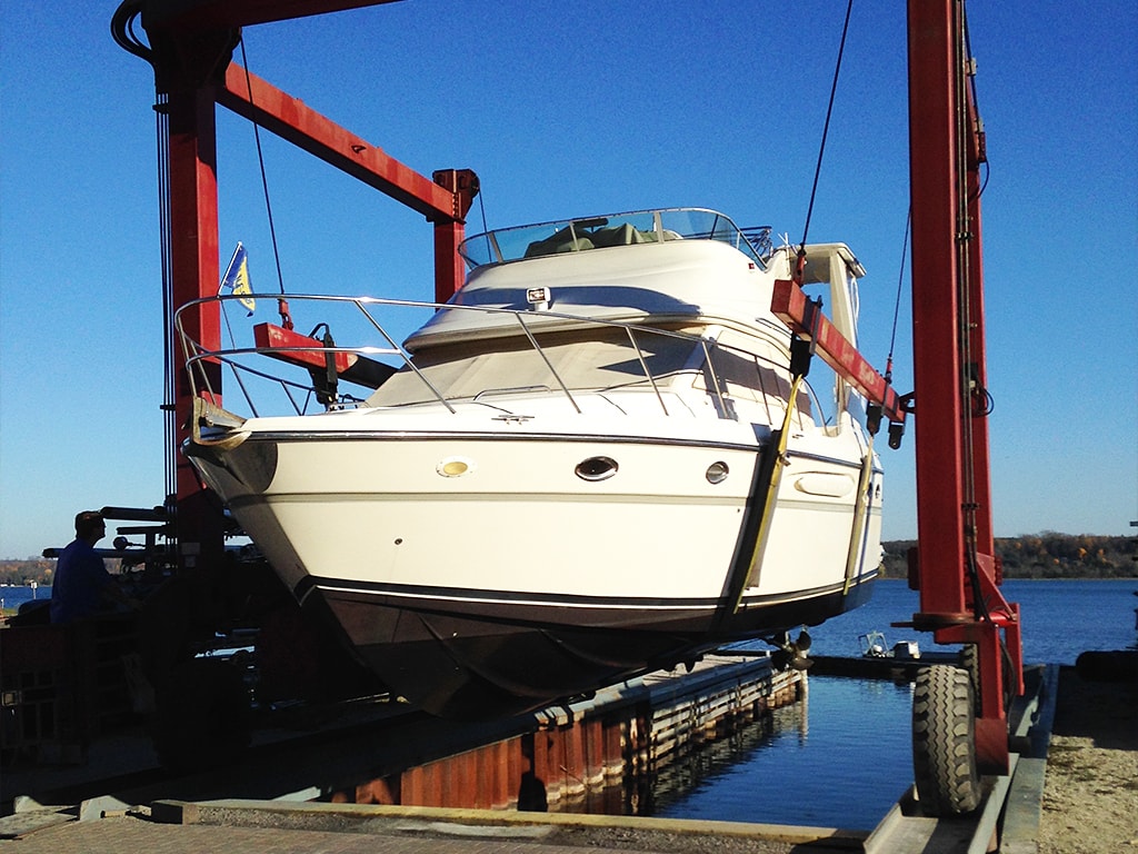 Boat moored at a wooden marina dock